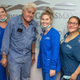 Comedian Jay Leno poses with hospital staff as he is released after burn care.